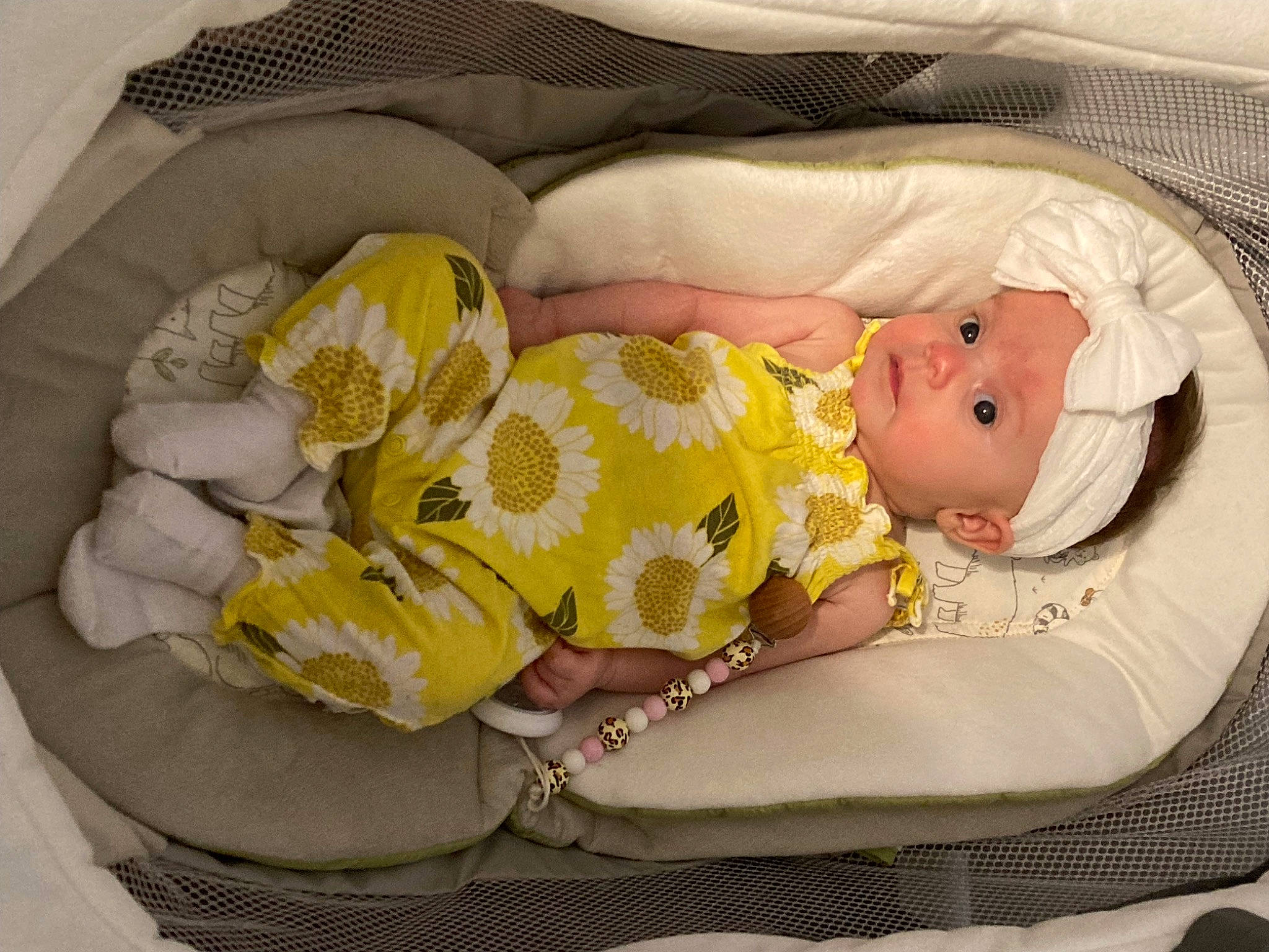 Brylee is registered to the contest to win money with this photo: baby, baby_products, baby_safety, baby_sleeping, baby_toddler_clothing, bedding, bedtime, child, comfort, couch, headgear, headwear, infant_bed, lap, linens, nap, pattern, person, product, room