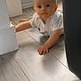 baby, child, crawling, floor, white_shirt, indoor, window_blinds, wooden_floor, curious, person, infant, flooring, light, home, young_child, head, face, hands, feet, casual_clothing