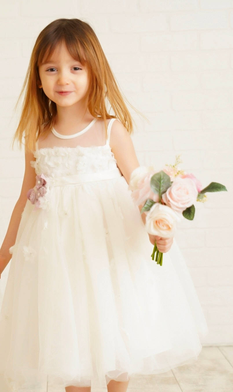 Isabelle joined the competition — help win amazing prizes! arm, bridal_party_dress, clothing, day_dress, dress, face, flower, gown, hair, happy, head, human_body, joy, one_piece_garment, person, pink, plant, shoulder, sleeve, smile