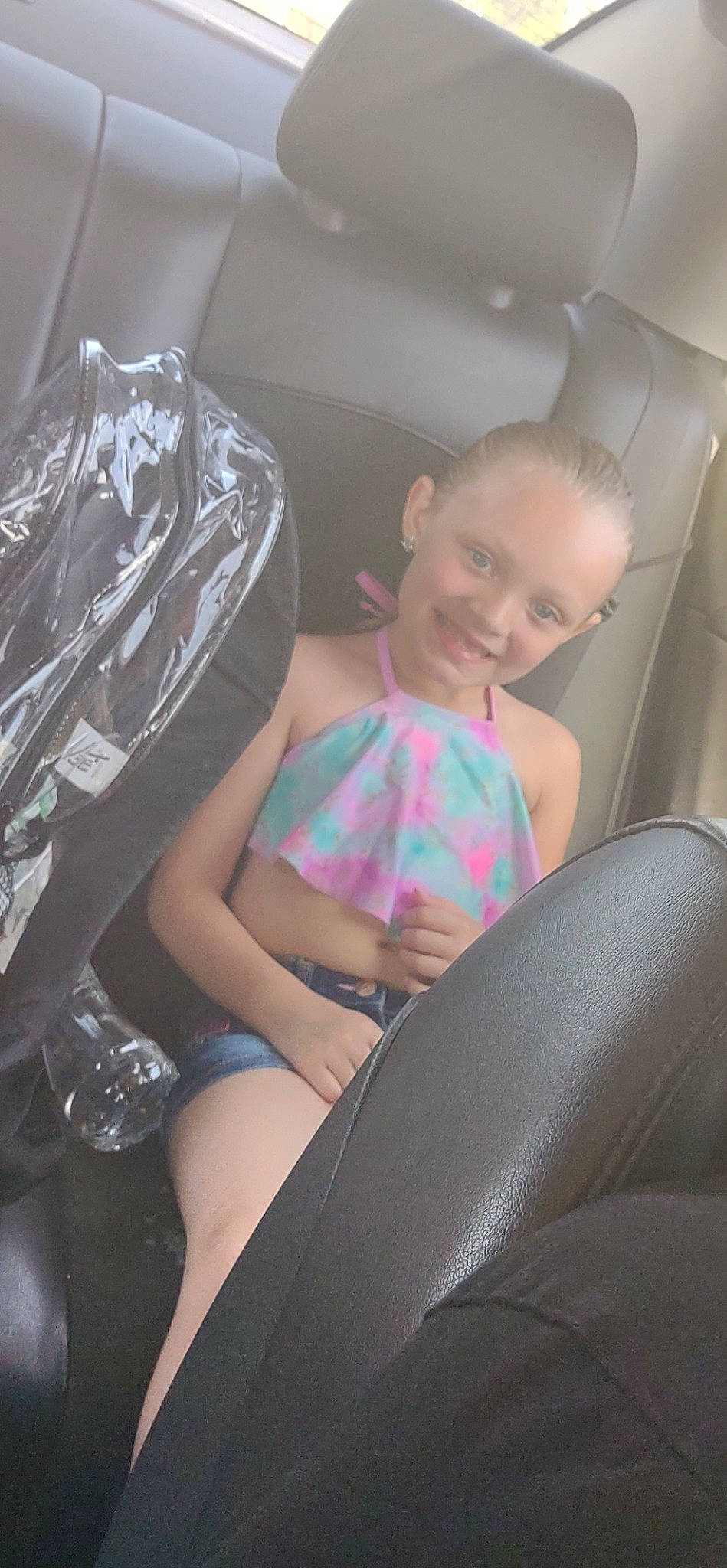 Lillian is registered to the contest to win money with this photo: auto_part, automotive_design, automotive_exterior, beauty, car, car_seat, car_seat_cover, comfort, flash_photography, fun, head_restraint, human_leg, joint, joy, knee, leg, motor_vehicle, person, smile, thigh