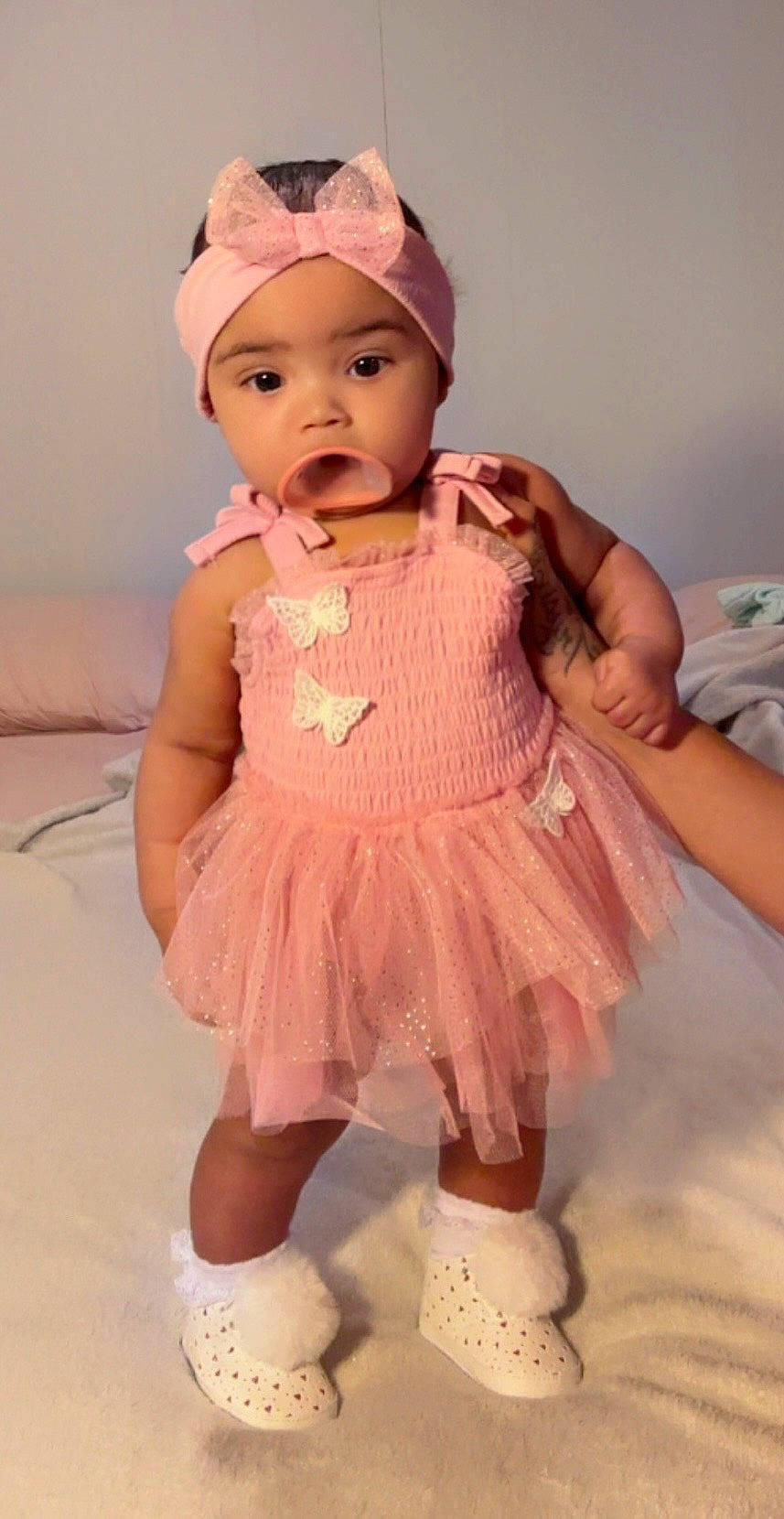 Sky is registered to the contest to win money with this photo: accessories, baby, baseballcap, bonnet, cap, clothing, costume, couch, dress, face, footwear, furniture, hat, head, person, photography, portrait, sandal, shoe, sitting