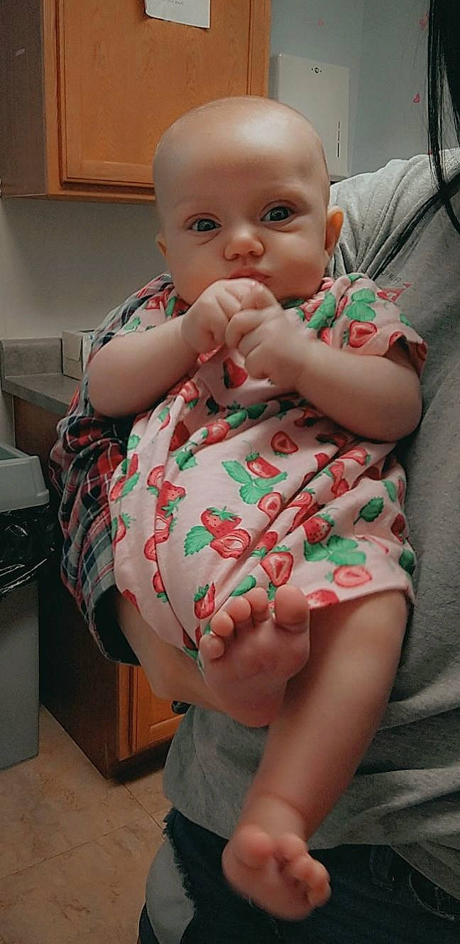 Stella is registered to the contest to win money with this photo: baby, baby_toddler_clothing, cheek, child, chin, comfort, eye, face, finger, gesture, happy, iris, lip, mouth, nail, nose, person, skin, sleeve, thumb