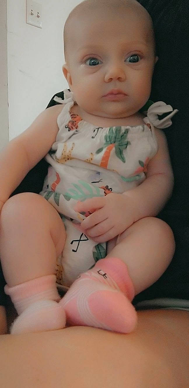 Stella joined the competition — help win amazing prizes! abdomen, baby, baby_toddler_clothing, blue, cheek, chest, comfort, elbow, finger, human_leg, joint, knee, neck, person, pink, skin, sleeve, stomach, thigh, toddler