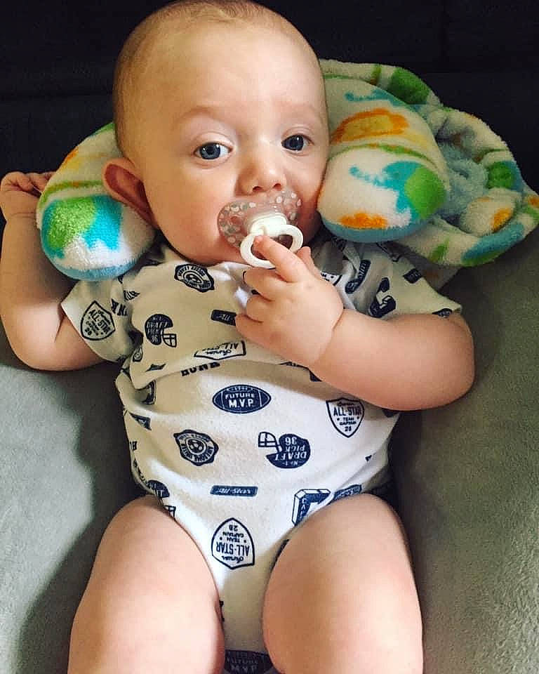 Emmitt is registered to the contest to win money with this photo: baby, baby_products, baby_toddler_clothing, cheek, child, diaper, finger, head, leg, nail, person, product, skin, thigh, toddler