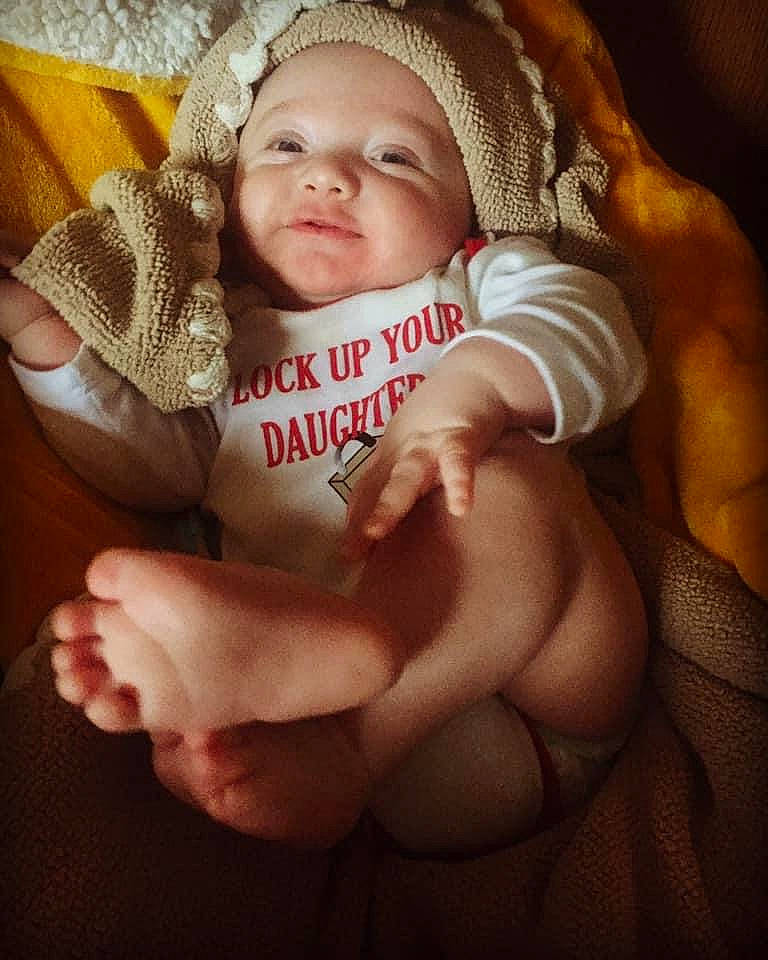 Emmitt is registered to the contest to win money with this photo: baby, cheek, child, finger, hand, muscle, person, photography, smile, thumb, toddler