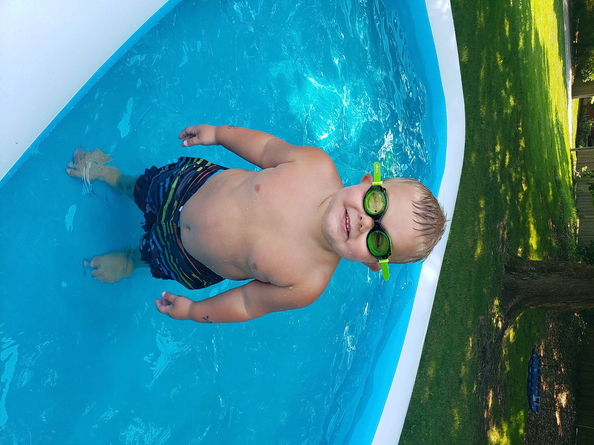 Braedyn is registered to the contest to win money with this photo: aqua, azure, bathing, chest, elbow, electric_blue, fun, games, happy, human_body, joy, leisure, outdoor_recreation, people_in_nature, person, recreation, swimmer, swimming_pool, swimwear, thigh