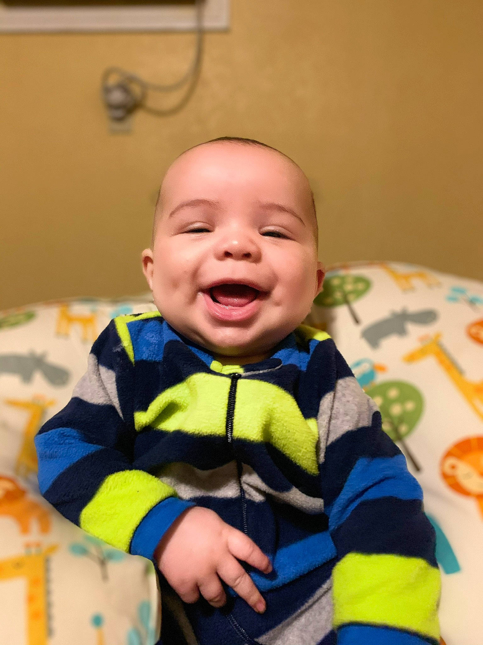 Roy is registered to the contest to win money with this photo: baby, cheek, child, face, facial_expression, happy, head, laugh, mouth, nose, person, play, sitting, skin, smile, toddler