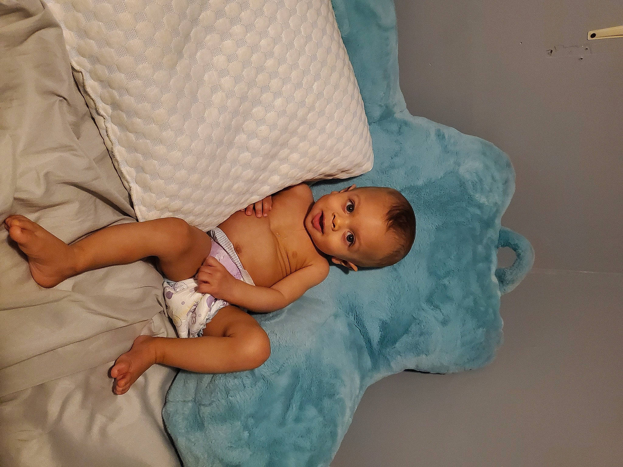 Zayne joined the competition — help win amazing prizes! abdomen, baby, baby_products, baby_toddler_clothing, child, comfort, diaper, elbow, eye, hand, hat, health_care, human_body, linens, pattern, person, room, sitting, skin, toddler