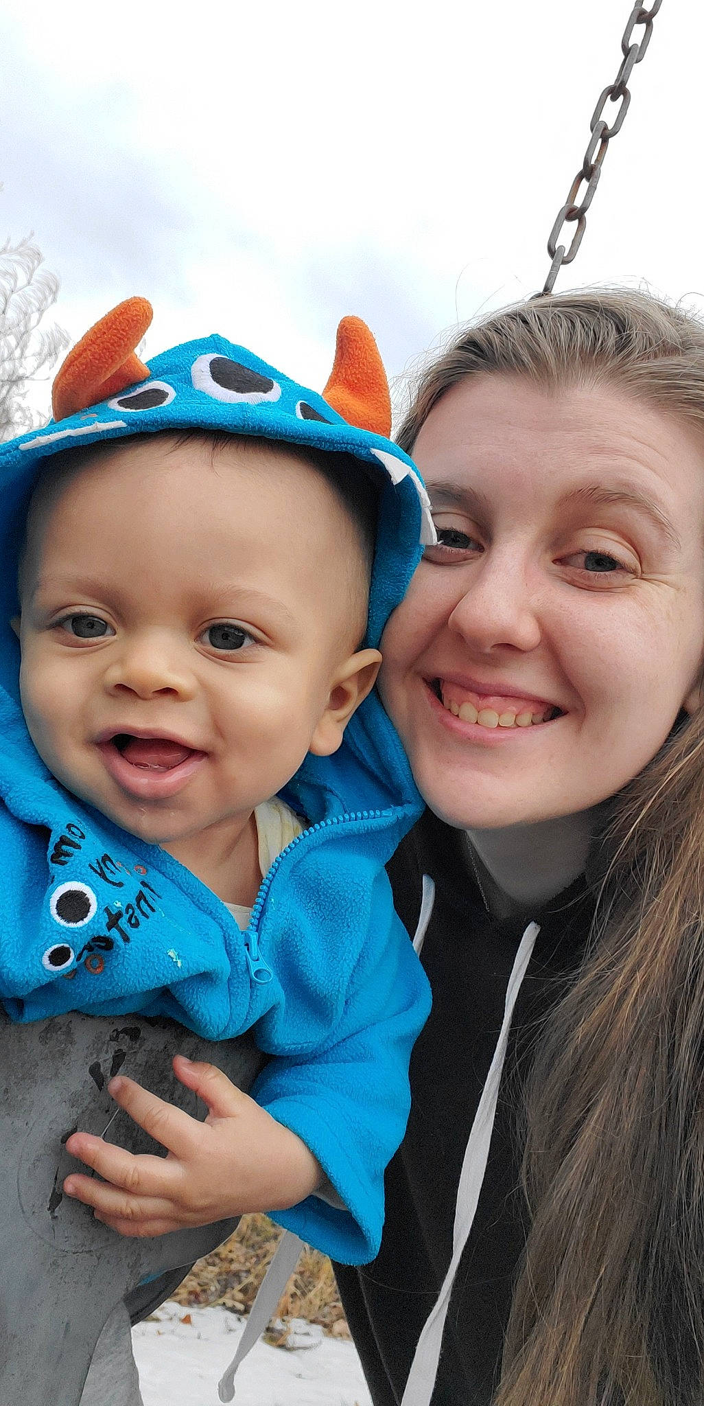 Zayne is registered to the contest to win money with this photo: azure, baby, baby_toddler_clothing, blue, cap, cool, eye, face, gesture, happy, head, interaction, iris, joy, outerwear, people_in_nature, person, plant, skin, smile