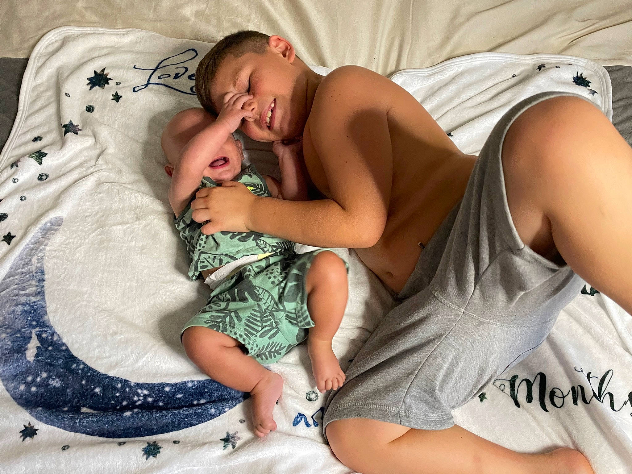 Cayden joined the competition — help win amazing prizes! abdomen, arm, baby, chest, comfort, finger, flash_photography, gesture, hand, happy, human_body, linens, mouth, muscle, people, person, shoulder, skin, textile, thigh