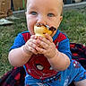 Onyx is registered to the contest to win money with this photo: baby, child, ice_cream, outdoor, grass, blue_clothing, red_clothing, spiderman, blanket, holding, food, cute, happy, face, person, summer, snack, sitting, sweet, playful