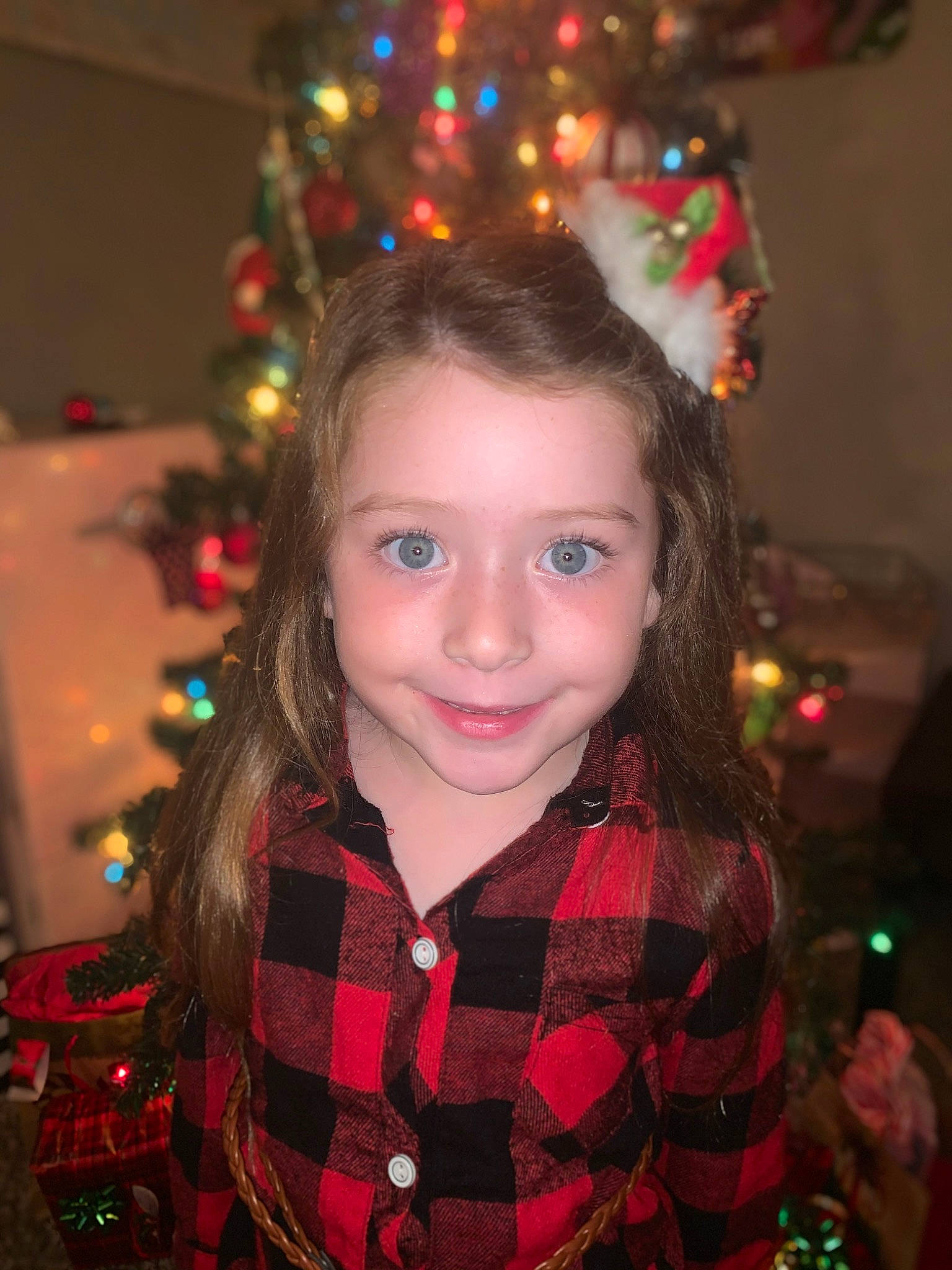Kendall joined the competition — help win amazing prizes! black, cheek, christmas, christmas_decoration, christmas_ornament, christmas_tree, facial_expression, fun, green, happy, holiday_ornament, joy, light, lighting, people, person, red, sleeve, smile, standing