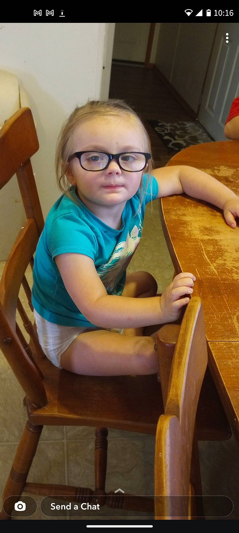 Jazmine joined the competition — help win amazing prizes! chair, child, comfort, elbow, eyewear, flooring, fun, furniture, glasses, hairstyle, hardwood, human_leg, leisure, person, room, sitting, thigh, toddler, varnish, vision_care