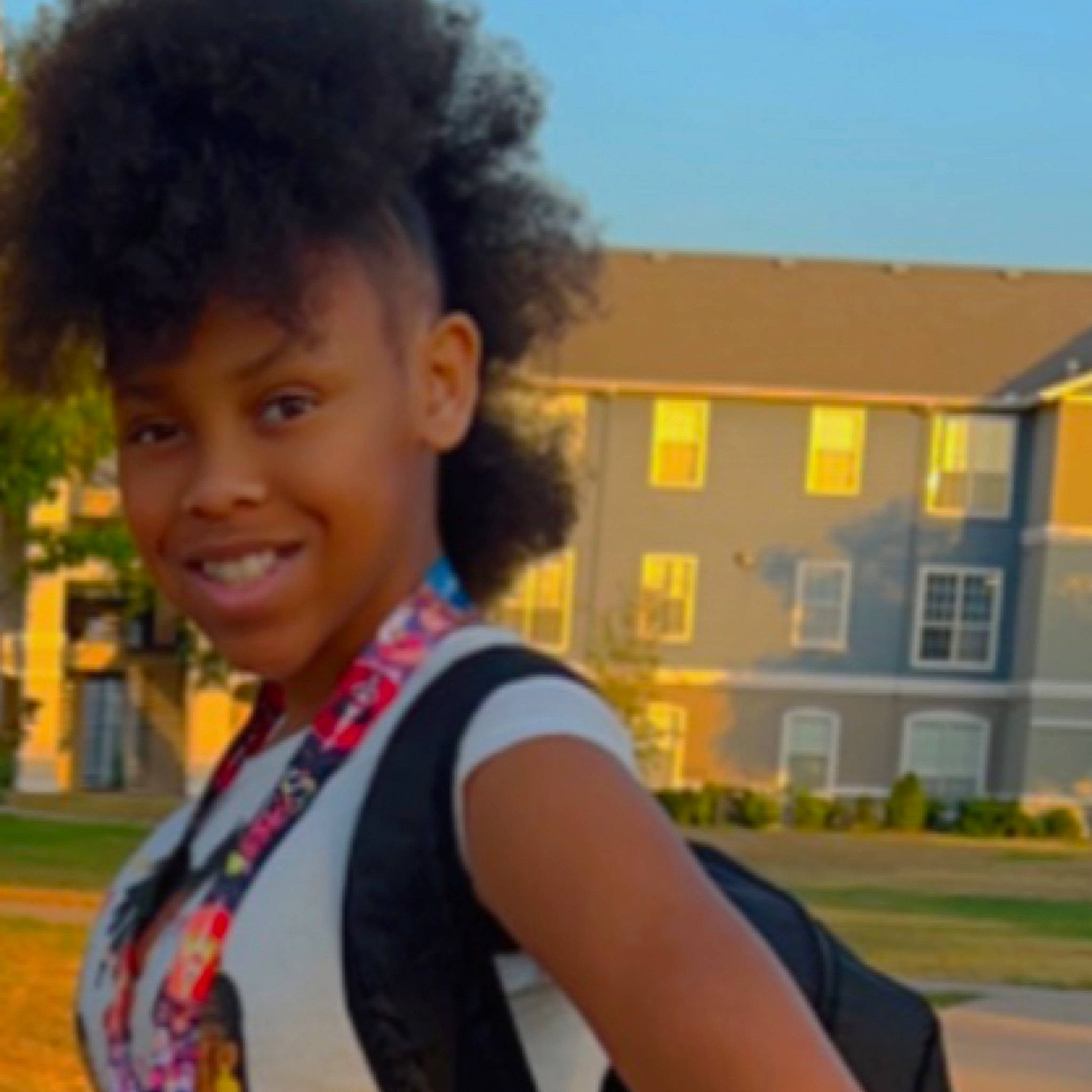 Janiya joined the competition — help win amazing prizes! afro, chest, cool, electric_blue, eyewear, facial_expression, fun, grass, happy, jewellery, joy, leisure, morning, person, plant, recreation, smile, t_shirt, travel, tree