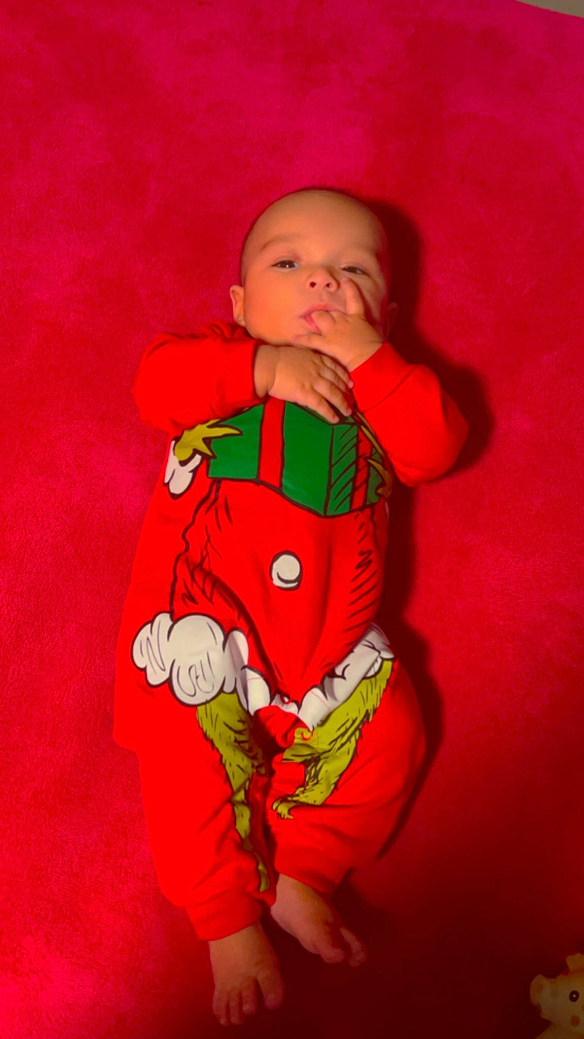 Zyaire joined the competition — help win amazing prizes! arm, baby, baby_toddler_clothing, carmine, cheek, child, christmas, comfort, costume, event, fictional_character, hand, human_body, magenta, pattern, peach, person, sitting, skin, sleeve