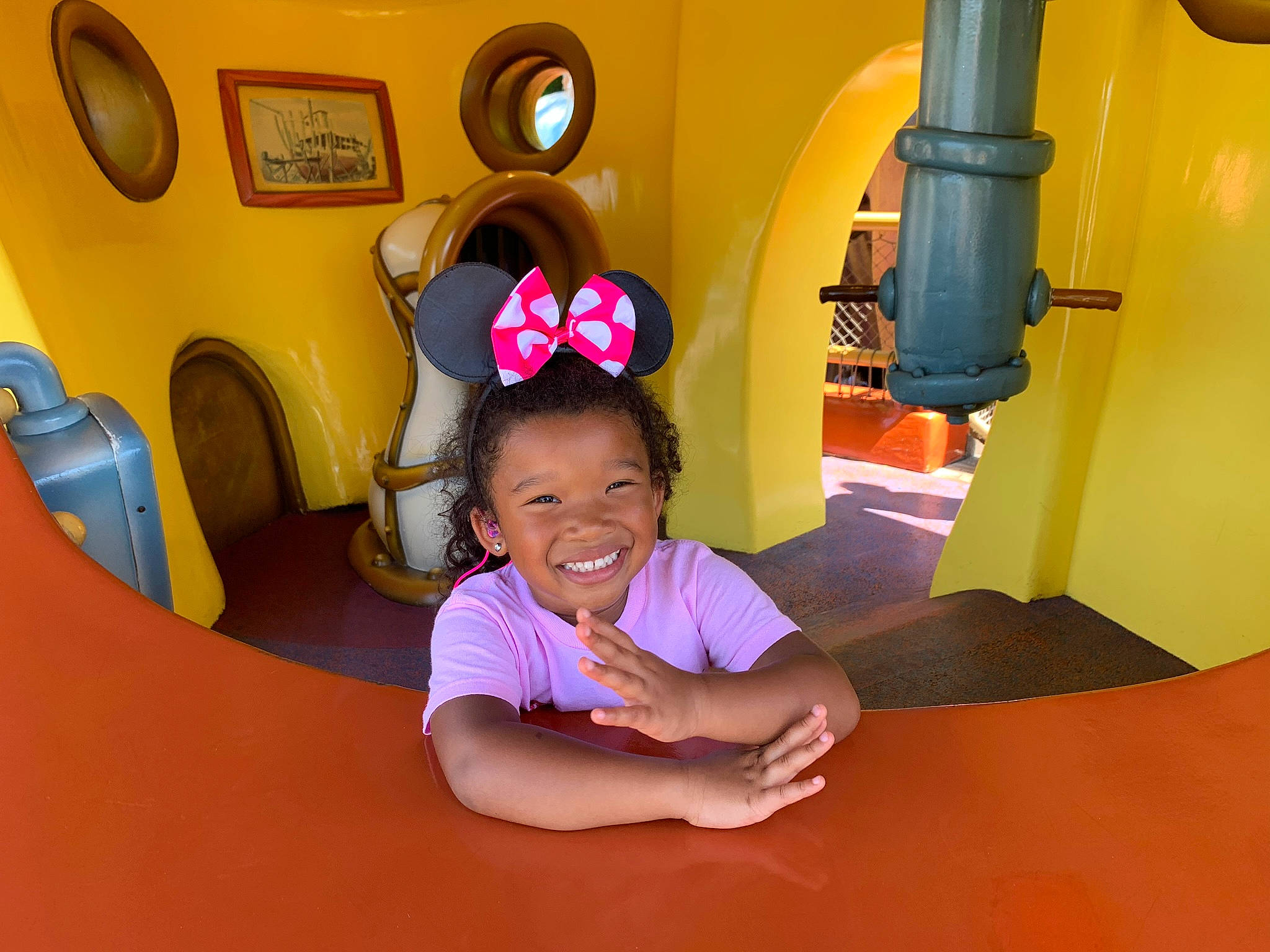 Celine is registered to the contest to win money with this photo: child, fun, joy, leisure, person, play, room, smile, snapshot, toddler, yellow