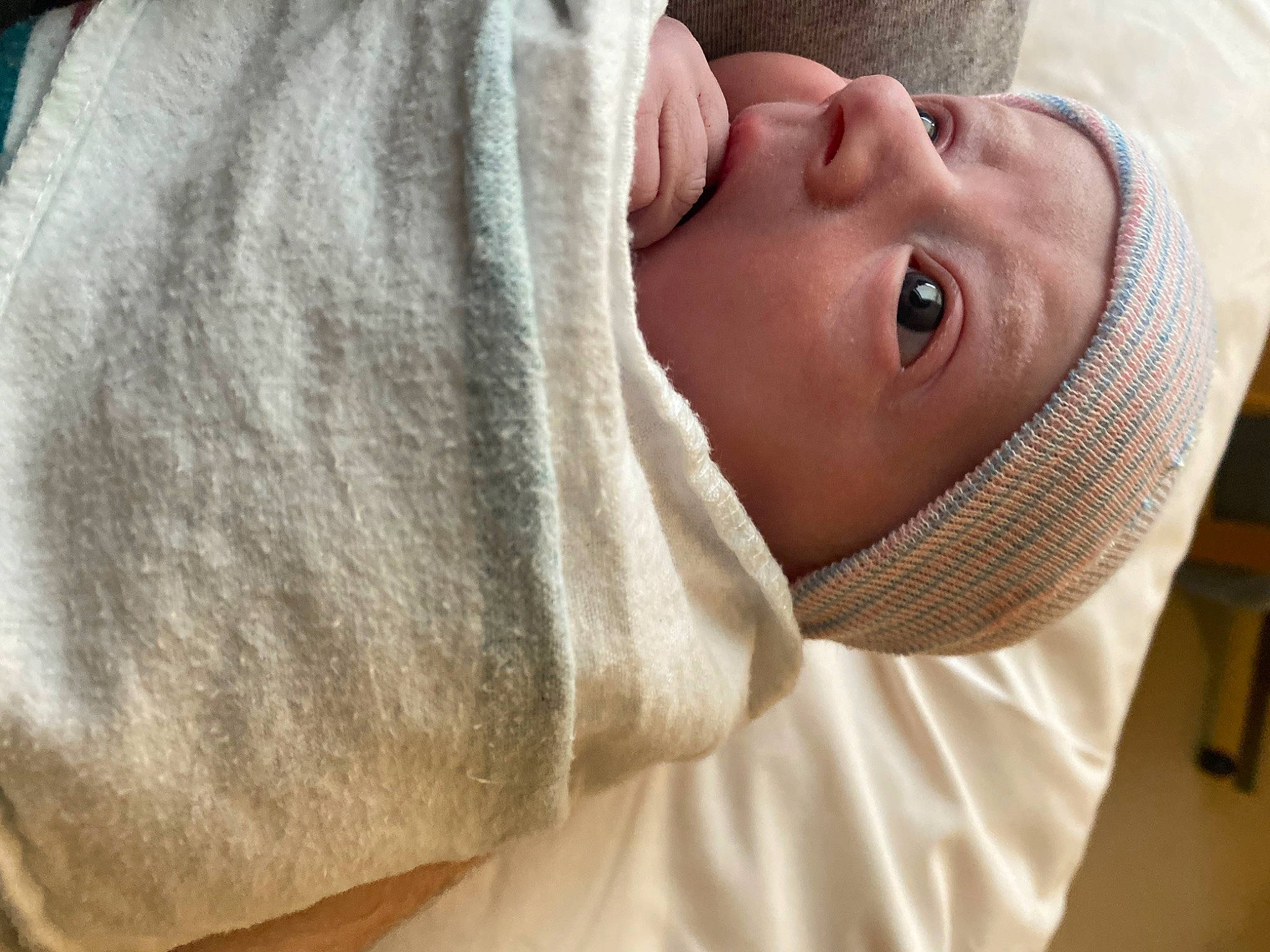 Levi joined the competition — help win amazing prizes! baby, baby_toddler_clothing, cap, child, collar, comfort, eye, eyelash, face, facial_expression, happy, hat, headgear, headwear, linens, neck, person, skin, sleeve, textile