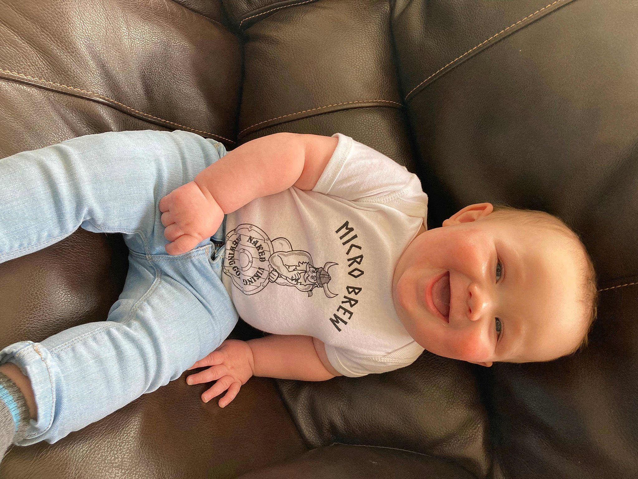 Briggs joined the competition — help win amazing prizes! abdomen, baby, baby_sleeping, baby_toddler_clothing, chest, child, comfort, couch, elbow, finger, flash_photography, human_leg, joy, knee, person, sitting, sleeve, smile, thigh, toddler