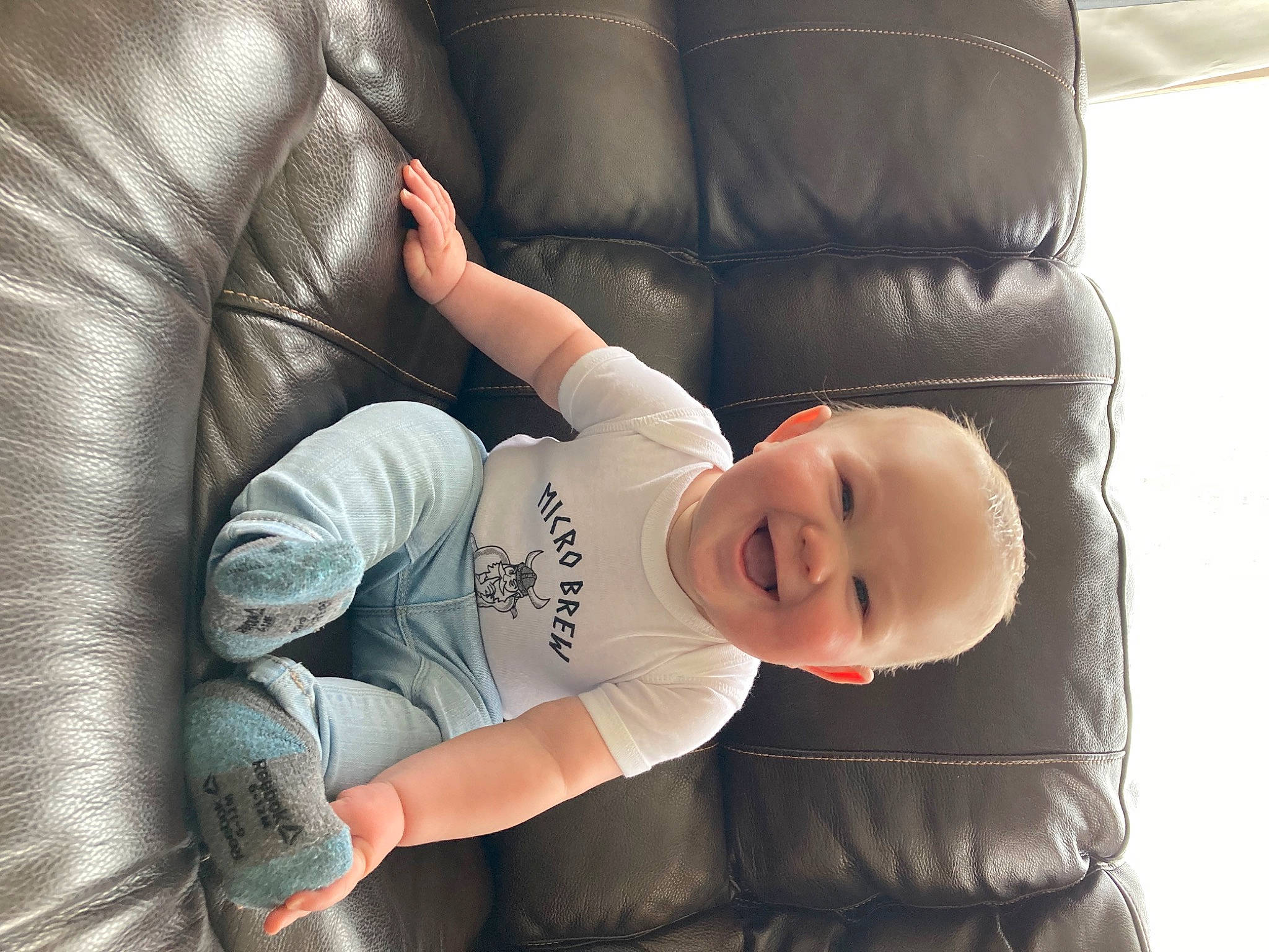 Briggs joined the competition — help win amazing prizes! arm, baby, baby_carriage, baby_products, baby_toddler_clothing, child, comfort, couch, elbow, eye, happy, head, human_leg, joy, knee, linens, person, room, sitting, smile