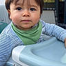 Lino participe au concours pour gagner de l'argent avec cette photo : toddler, child, baby, high_chair, green_bandana, striped_shirt, outdoor, window, curious, face, person, young_child, furniture, daylight, brown_hair, expression, looking, sitting, home, casual