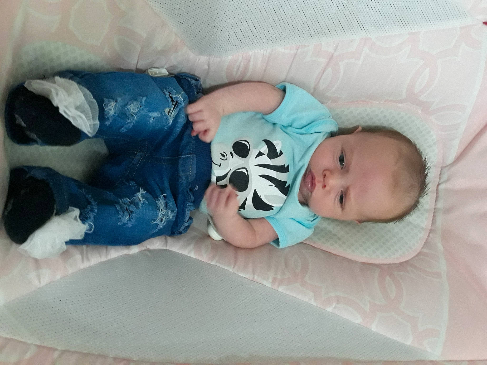 Jazmin joined the competition — help win amazing prizes! arm, baby, baby_products, baby_toddler_clothing, bedtime, child, comfort, eye, face, head, linens, mammal, pattern, person, room, sitting, sleeve, sock, textile, toddler