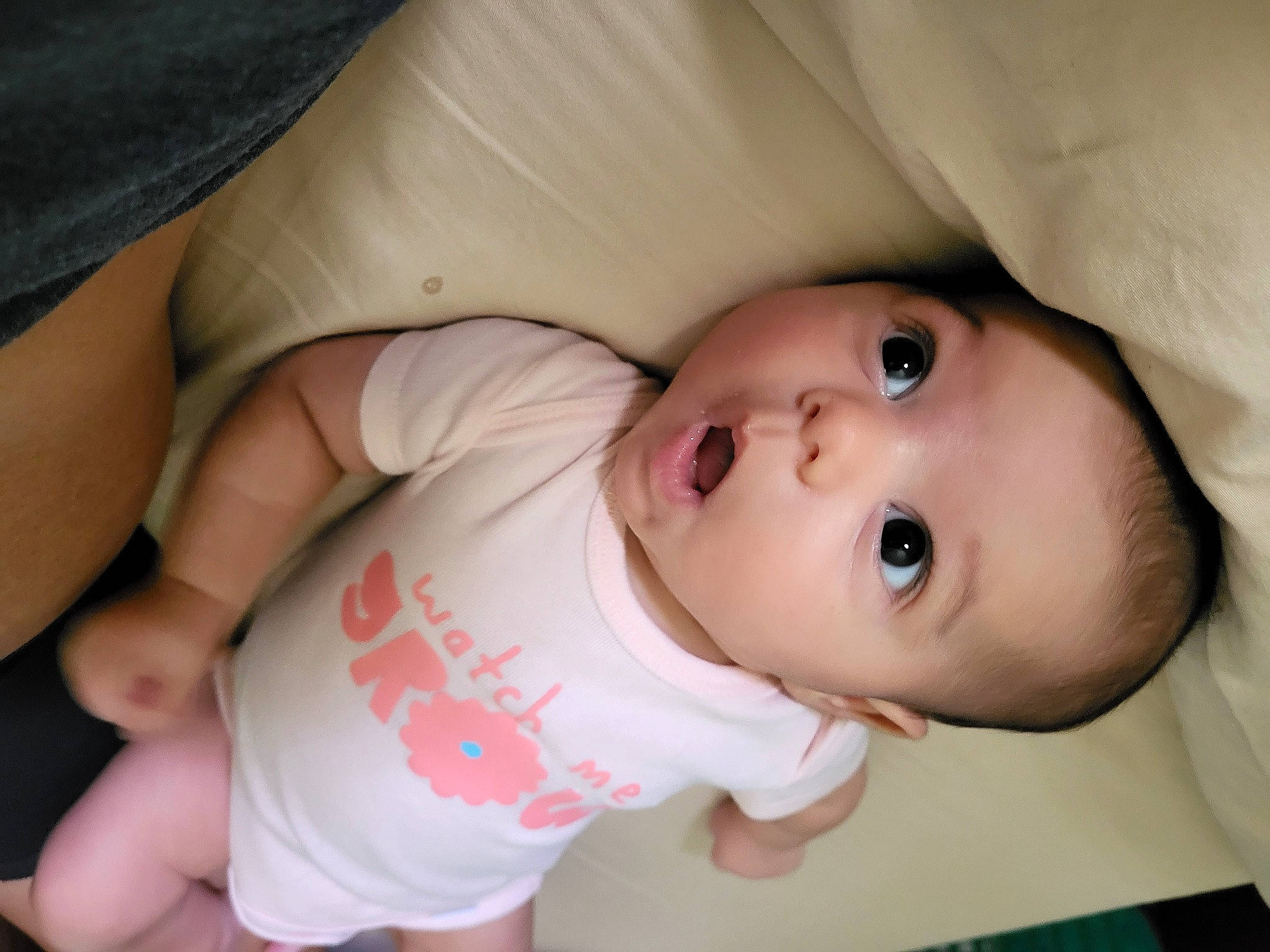 Josephine joined the competition — help win amazing prizes! baby, baby_products, baby_toddler_clothing, cheek, child, comfort, elbow, eye, eyelash, gesture, human_body, iris, lip, mouth, nose, person, sitting, skin, sleeve, surprise