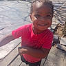 Seyven joined the competition — help win amazing prizes! child, smiling, outdoor, pavement, tree, bench, sunlight, shadow, casual_clothing, red_tshirt, black_pants, happy, person, portrait, daytime, playful, young_child, urban_park, nature, walking
