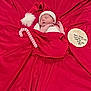 Percy joined the competition — help win amazing prizes! newborn, baby, infant, sleeping, red_blanket, santa_hat, candy_cane, wooden_plaque, birth_announcement, holiday, christmas, soft_fabric, portrait, cute, wrapped, peaceful, face, head, baby_clothes, resting