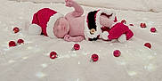 Percy joined the competition — help win amazing prizes! newborn, baby, sleeping, santa_hat, knitted_clothing, red, white, blanket, fairy_lights, christmas_ornaments, holiday, festive, cute, infant, soft_texture, cozy, decorations, indoors, peaceful, portrait