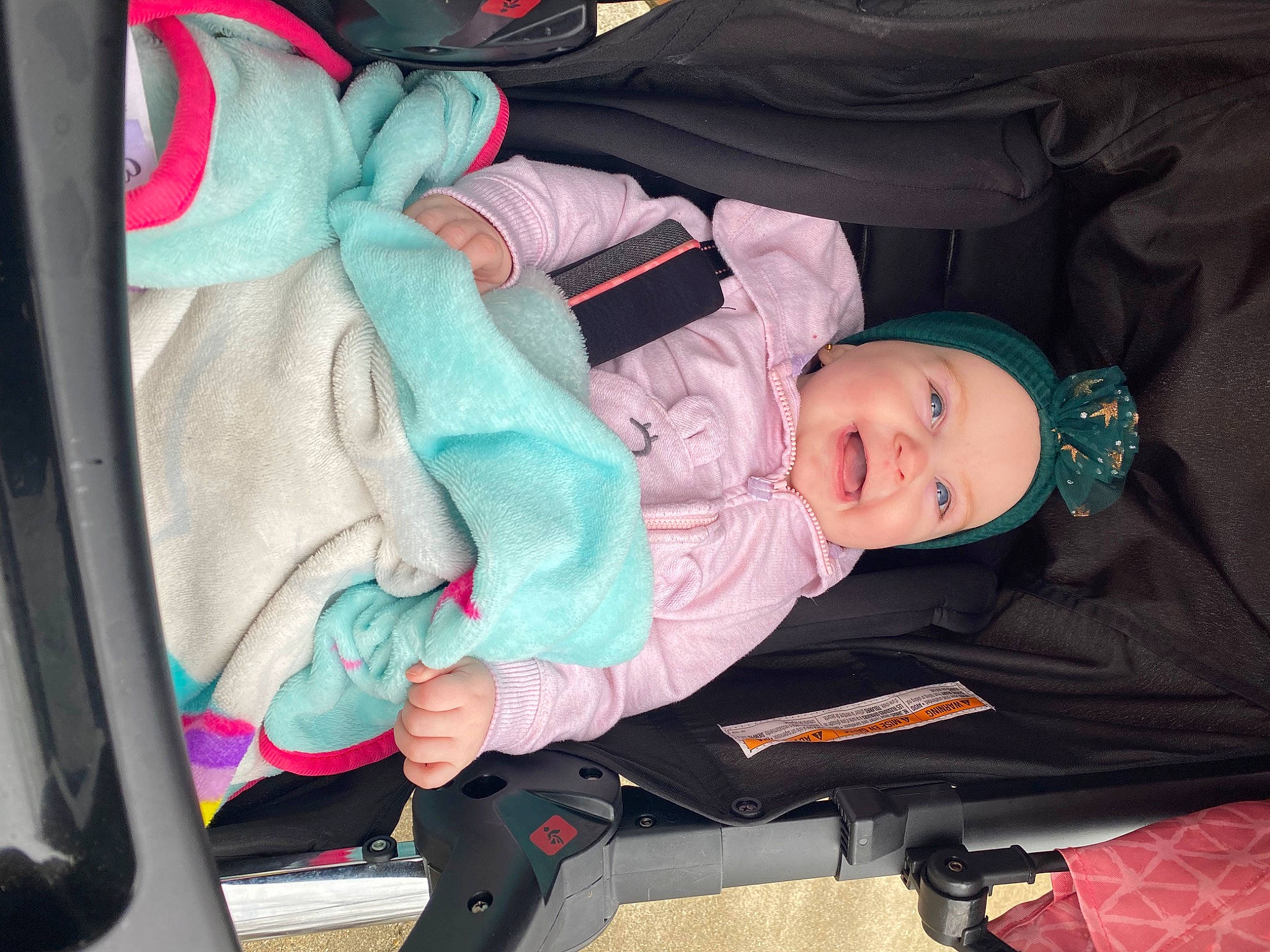 Mercedes is registered to the contest to win money with this photo: auto_part, baby, baby_carriage, baby_products, baby_safety, baby_toddler_clothing, car_seat, cheek, child, comfort, face, family_car, fun, headwear, mammal, person, product, sitting, toddler, tree