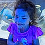 Charlotte is registered to the contest to win money with this photo: adult, animal, aquarium, aquatic, bird, child, clothing, face, female, fish, girl, head, male, man, person, photography, portrait, sealife, t_shirt, water