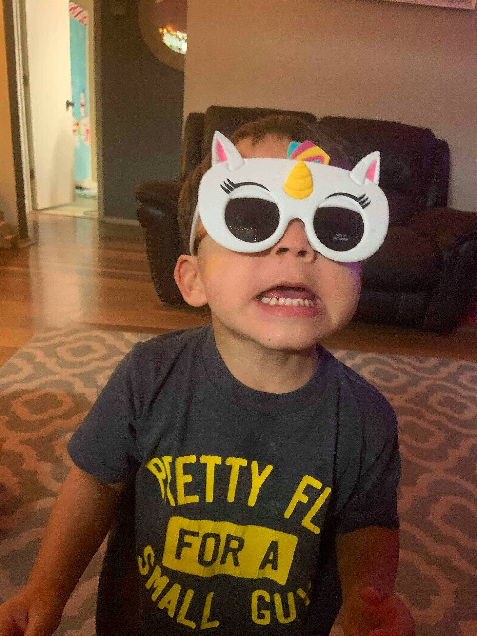 De'Shayne is registered to the contest to win money with this photo: child, cool, eyewear, fun, glasses, goggles, head, person, personal_protective_equipment, sunglasses, t_shirt, vision_care