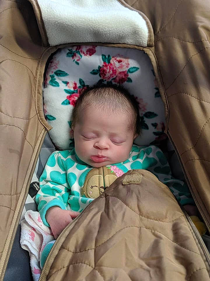 Camille is registered to the contest to win money with this photo: baby, baby_in_car_seat, car_seat, child, comfort, nap, person, sleep, toddler