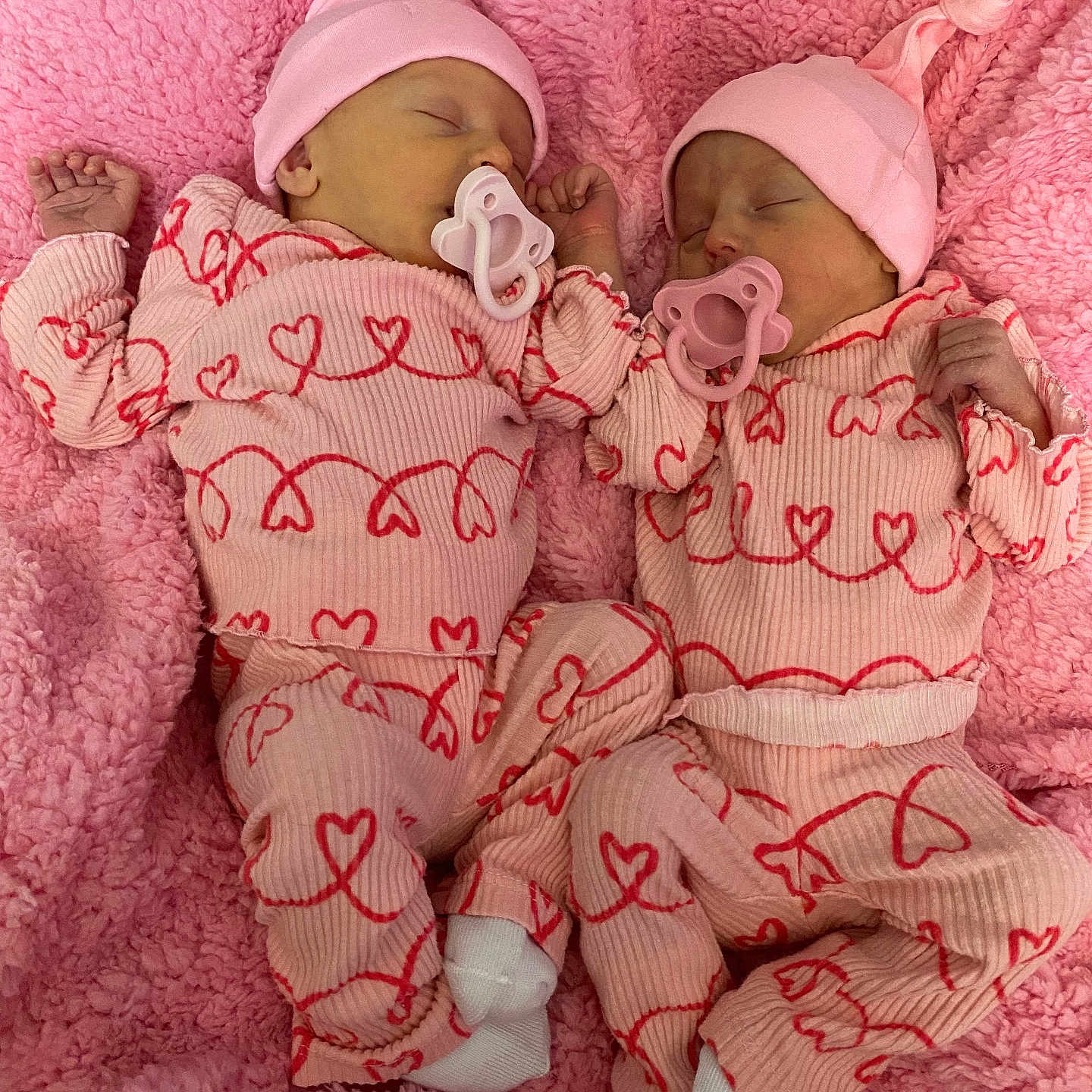 Scarlett And Mabel is registered to the contest to win money with this photo: baby, bed, bedroom, blanket, bonnet, cap, clothing, couch, face, furniture, hat, head, homedecor, newborn, pajamas, person, photography, portrait, quilt, sleeping