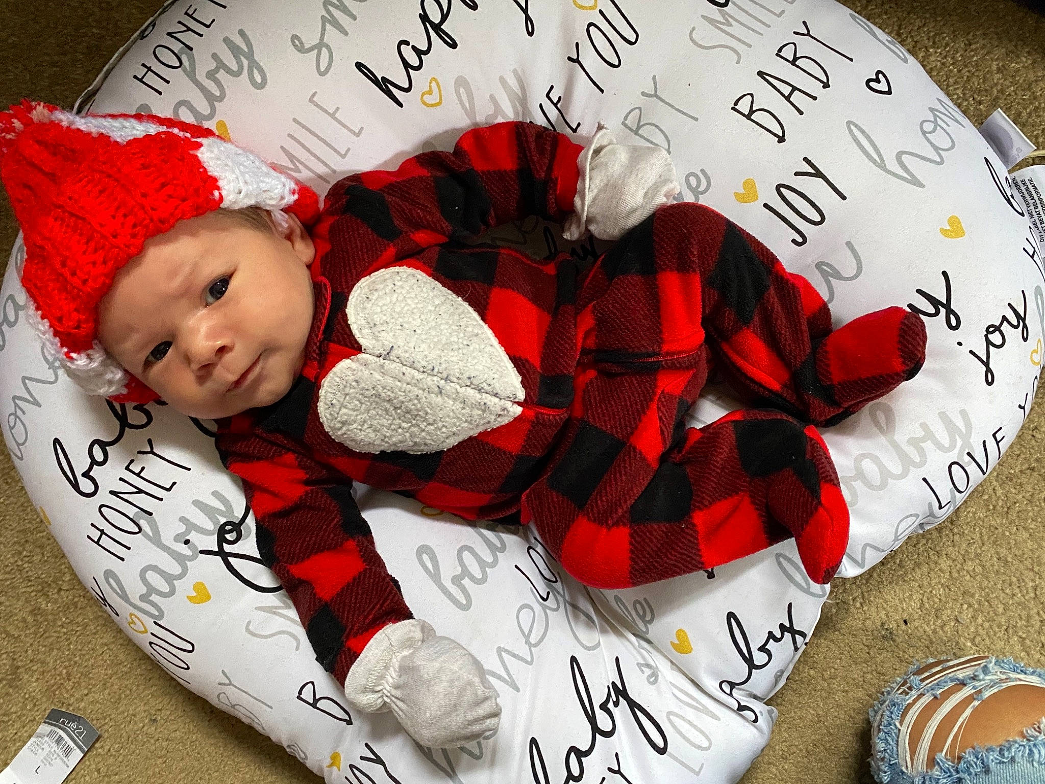 Loki joined the competition — help win amazing prizes! baby_toddler_clothing, carmine, christmas, christmas_decoration, christmas_eve, christmas_ornament, comfort, fictional_character, font, happy, headwear, holiday, lap, linens, pattern, person, plaid, red, smile, textile