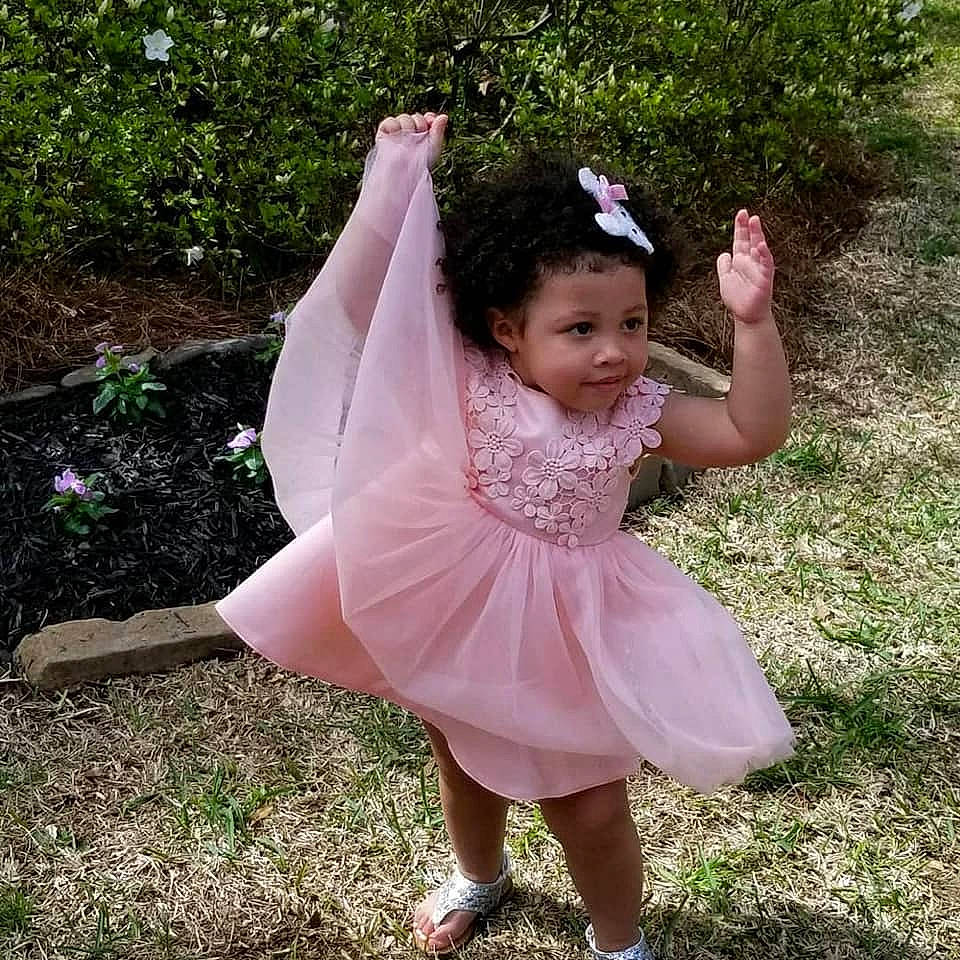 Max joined the competition — help win amazing prizes! abdomen, ballet_tutu, black_hair, child, clothing, costume, dance_dress, dress, flower, fun, girl, grass, hair_accessory, happiness, infant, person, pink, smile, summer, toddler