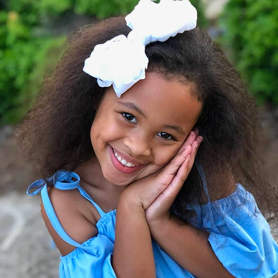 Amelia joined the competition — help win amazing prizes! beauty, black_hair, brown_hair, child, facial_expression, fun, girl, hair, hair_accessory, hair_coloring, hairstyle, happiness, headgear, joy, person, smile, toddler, vacation
