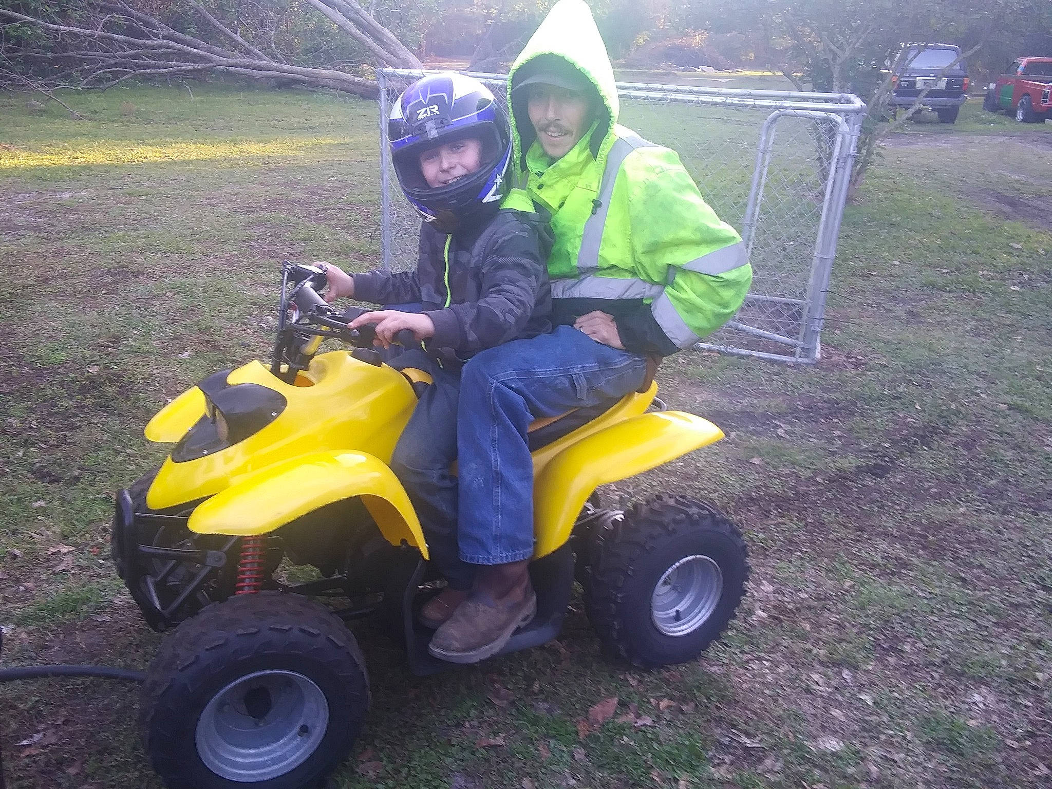 Bradley is registered to the contest to win money with this photo: all_terrain_vehicle, automotive_tire, automotive_wheel_system, car, electric_vehicle, fun, grass, headwear, land_vehicle, motor_vehicle, motorsport, off_roading, person, recreation, riding_toy, vehicle, wheel, yellow