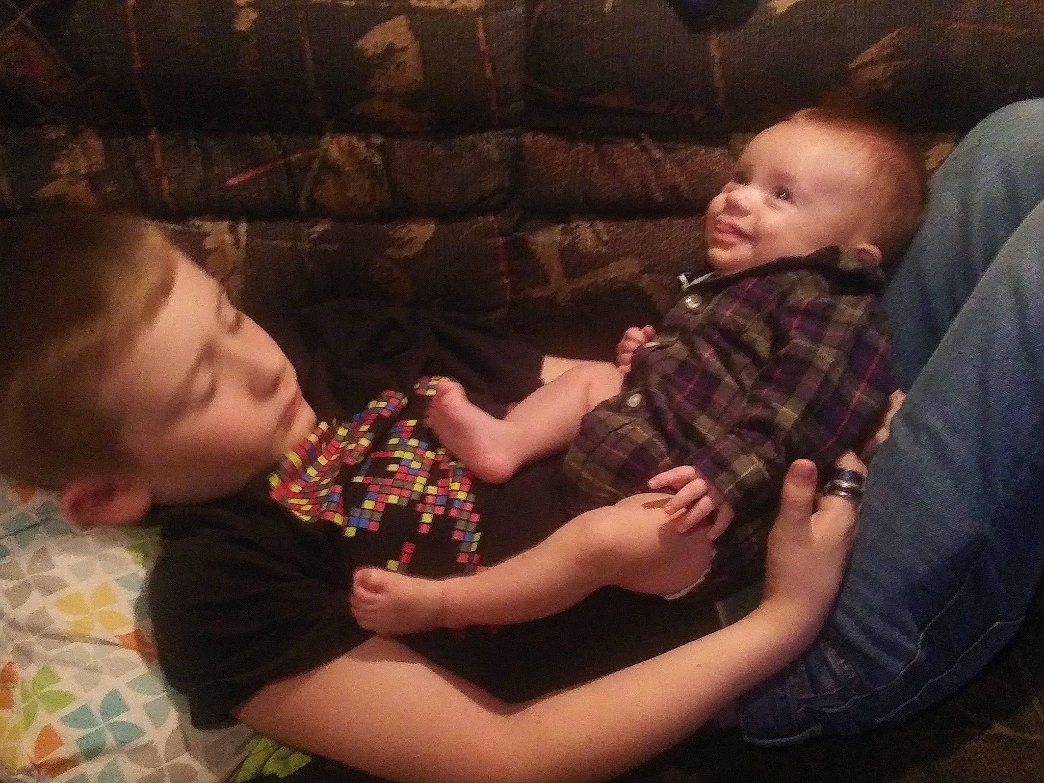 Bradley is registered to the contest to win money with this photo: adaptation, arm, baby, child, eye, family, finger, fun, gesture, hand, human, interaction, love, people, person, photography, play, sharing, sibling, sitting