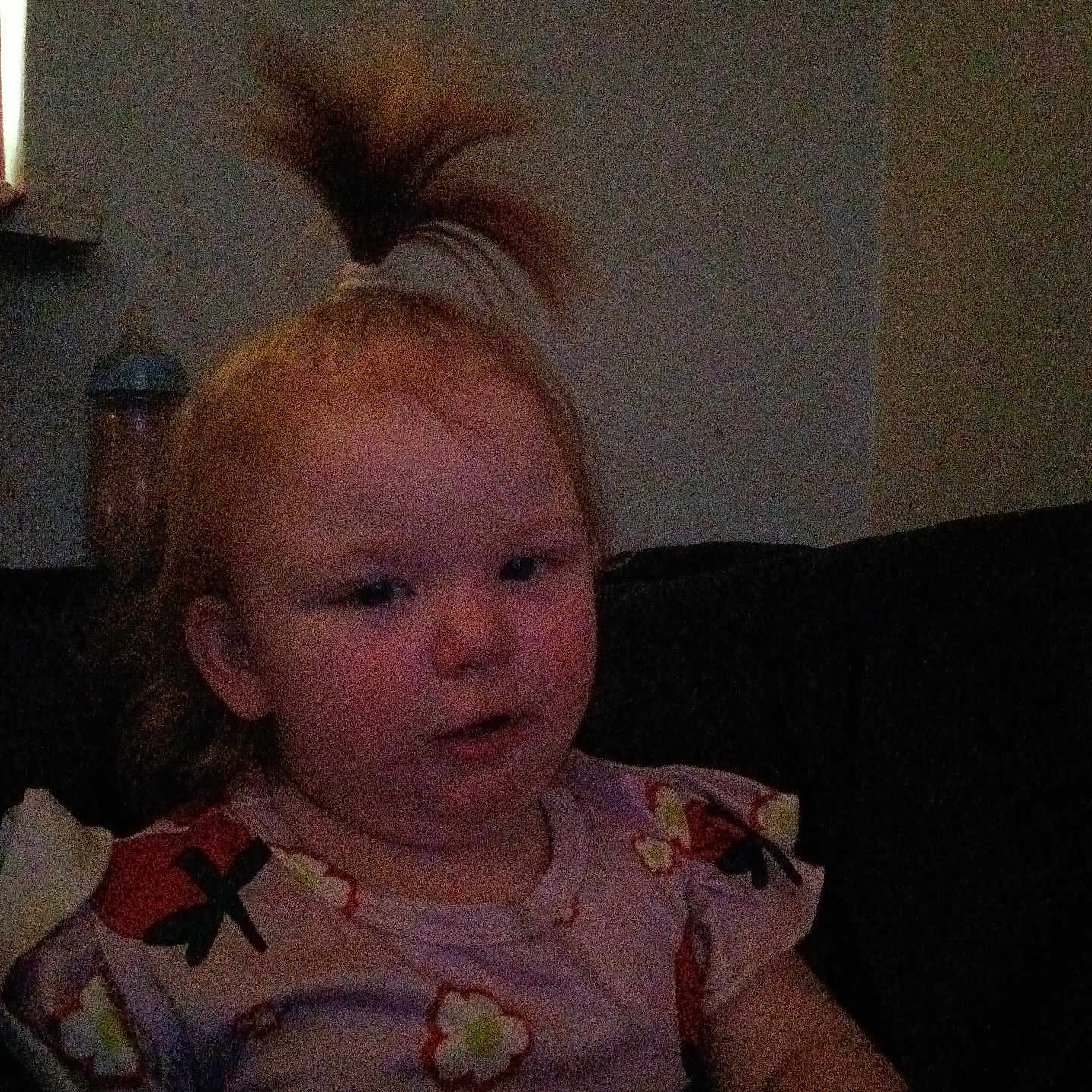 Jade joined the competition — help win amazing prizes! casual, child, couch, cute, dark, dim_lighting, expression, face, floral_shirt, hair, home, indoor, infant, person, pony_tail, portrait, relaxed, sitting, toddler, young_child