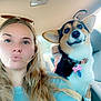 woman, dog, corgi, car, seat, collar, tag, blonde_hair, long_hair, sunglasses, pout, pet, indoor, casual, portrait, cute, happy, animal, companion, travel