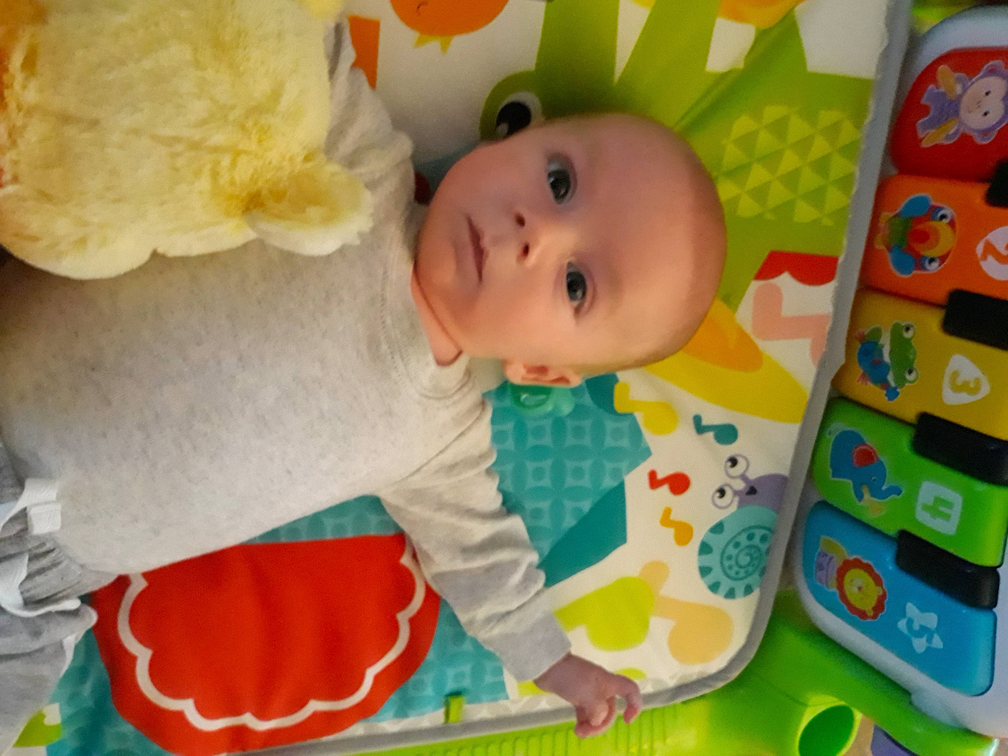 Devin is registered to the contest to win money with this photo: baby, baby_products, baby_safety, baby_toddler_clothing, baby_toys, cheek, child, comfort, fun, happy, linens, person, play, room, toddler, yellow