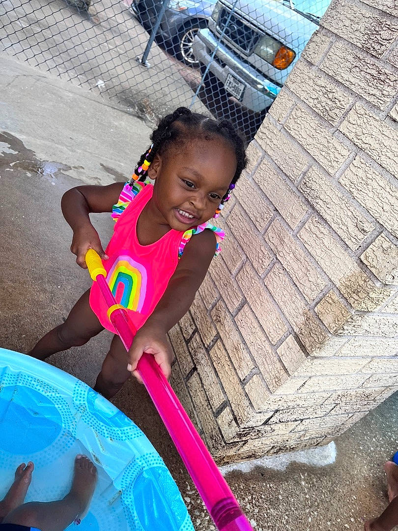 Paris joined the competition — help win amazing prizes! asphalt, automotive_tire, blue, car, child, cool, electric_blue, fun, happy, joy, leisure, magenta, person, pink, play, recreation, smile, snapshot, tire, toddler