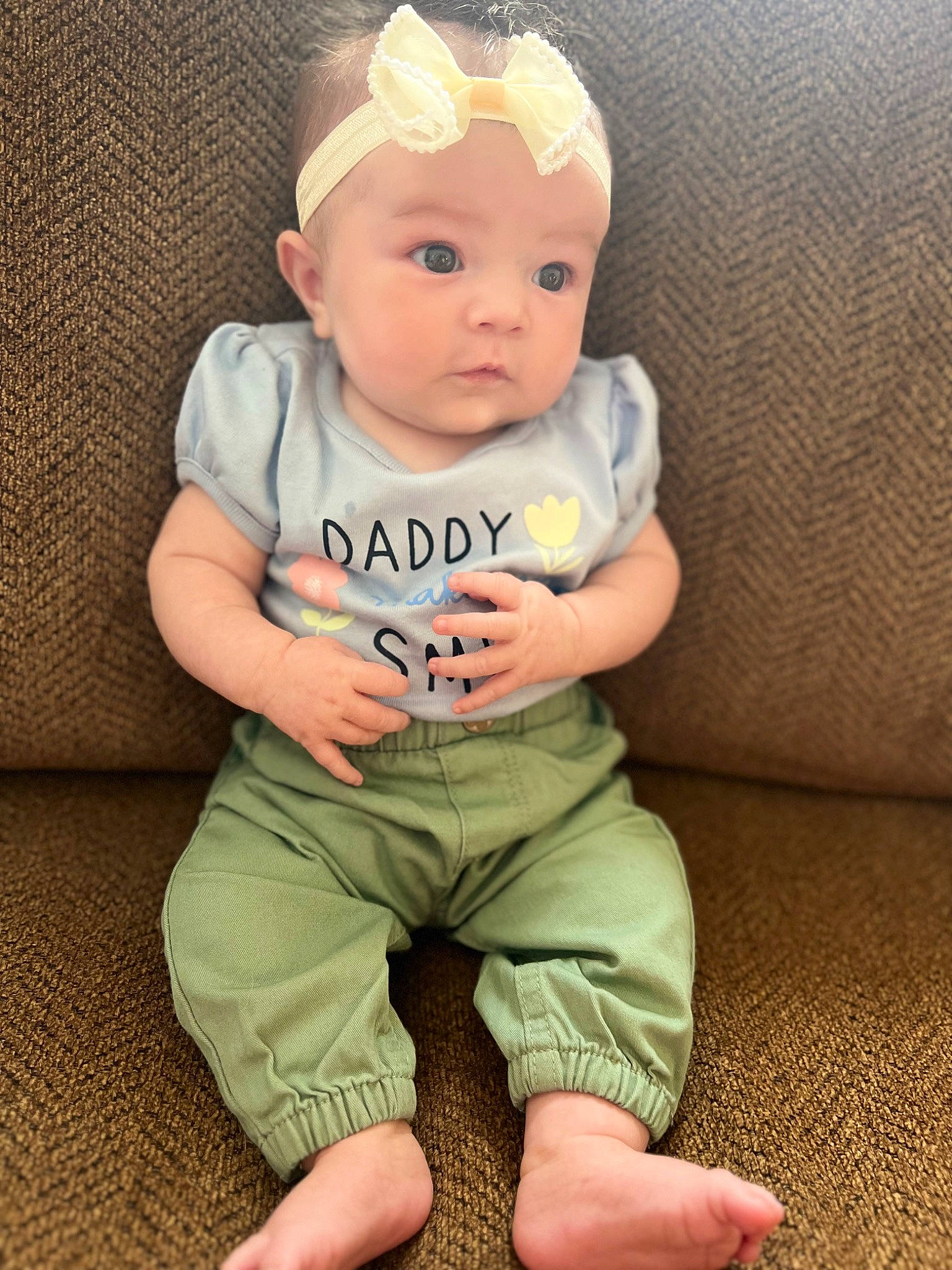 April joined the competition — help win amazing prizes! baby, baby_toddler_clothing, cheek, child, chin, comfort, eye, face, foot, hairstyle, happy, headwear, human_body, iris, linens, person, sitting, skin, sleeve, smile