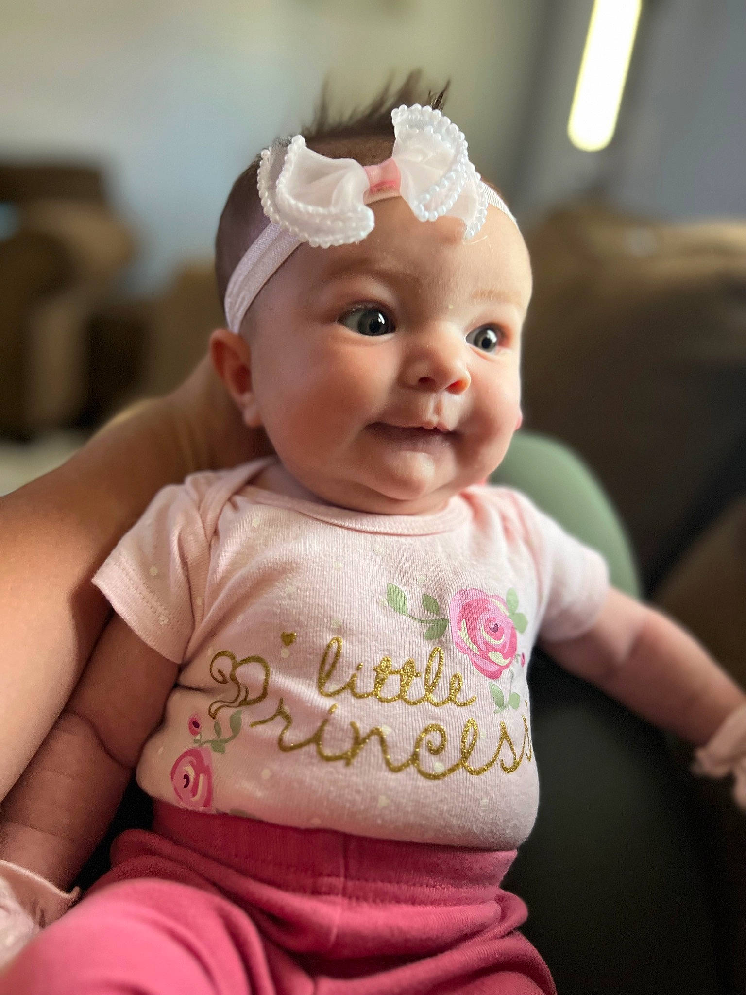 April joined the competition — help win amazing prizes! baby, baby_toddler_clothing, cap, cheek, child, chin, clothing, ear, eyelash, finger, happy, headband, headpiece, lip, person, pink, sitting, skin, sleeve, toddler