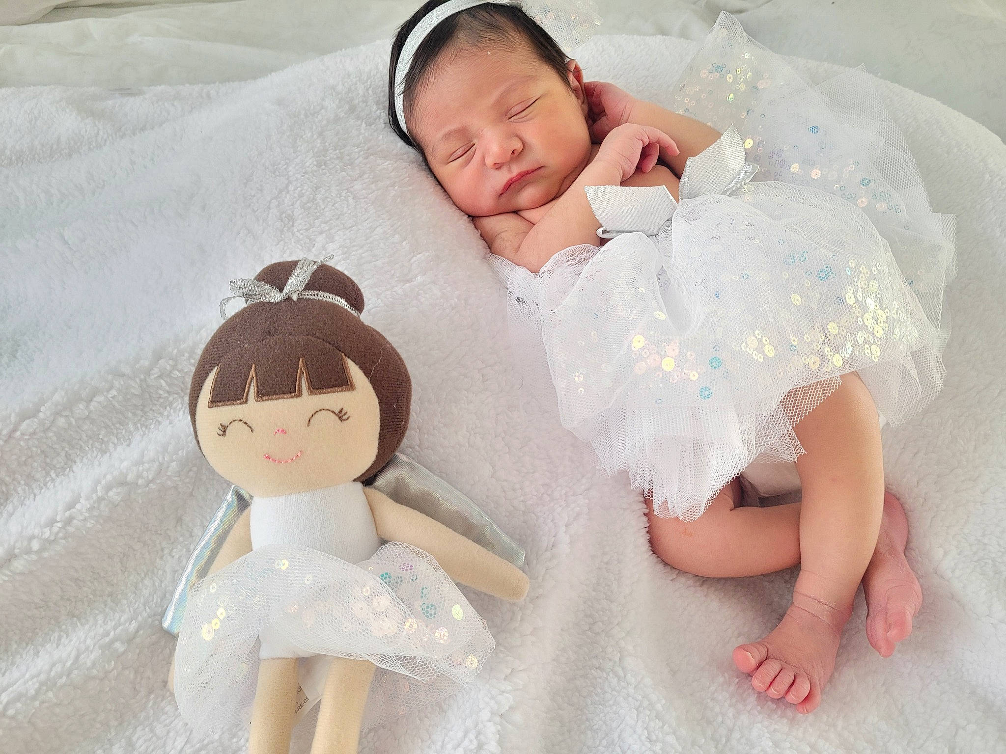 Vivian is registered to the contest to win money with this photo: comfort, doll, dress, eye, eyelash, facial_expression, finger, hair, happy, head, headgear, iris, organ, person, photograph, pink, product, skin, textile, toy