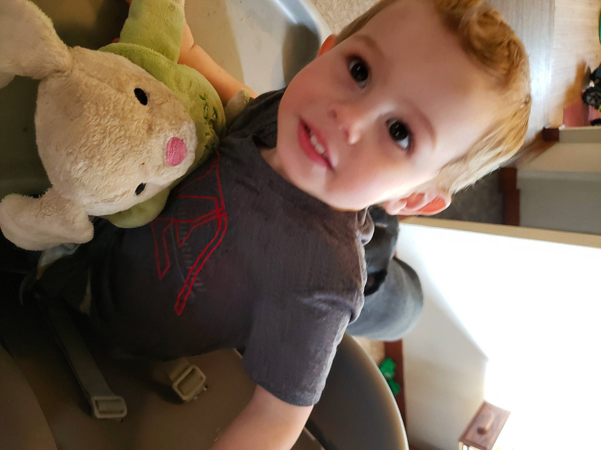 Brantley is registered to the contest to win money with this photo: arm, baby, baby_products, baby_toddler_clothing, cheek, child, comfort, elbow, fun, happy, head, nose, person, plush, room, skin, stuffed_toy, t_shirt, thigh, toddler