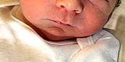 Kingston joined the competition — help win amazing prizes! arm, baby, blanket, child, closeup, cute, expression, eyes, face, hair, indoor, infant, newborn, nike_logo, onesie, person, portrait, skin, soft_light, white_clothing
