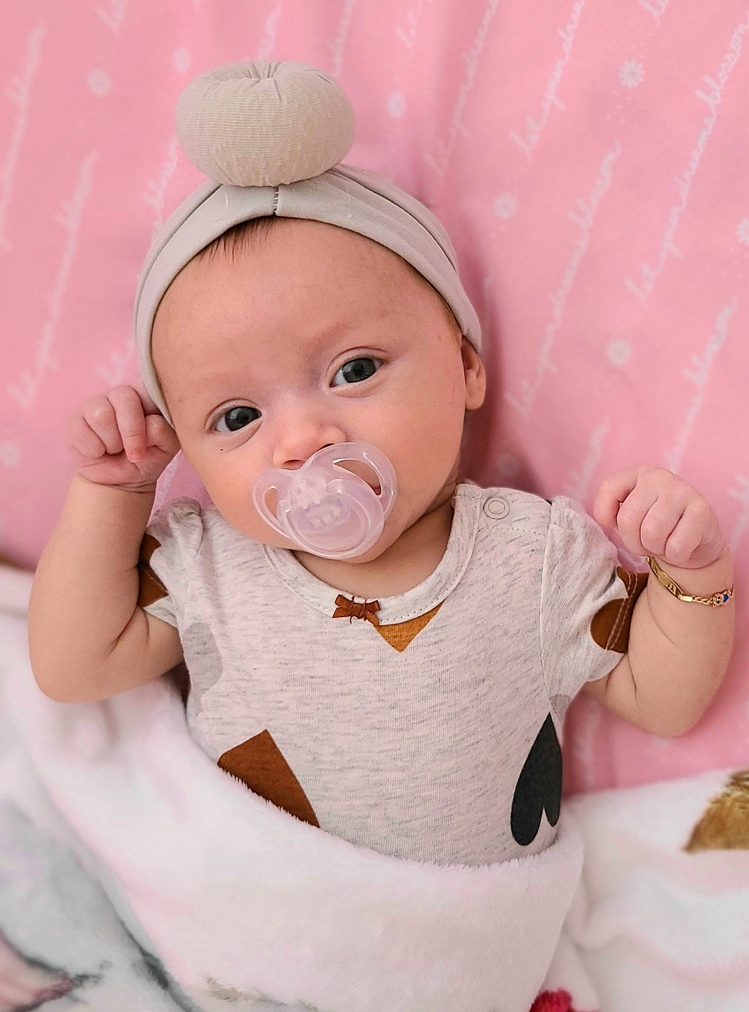 Yazmine joined the competition — help win amazing prizes! baby, baby_toddler_clothing, cap, cheek, chin, comfort, dress, eye, eyebrow, face, happy, head, linens, lip, peach, person, pink, product, skin, sleeve