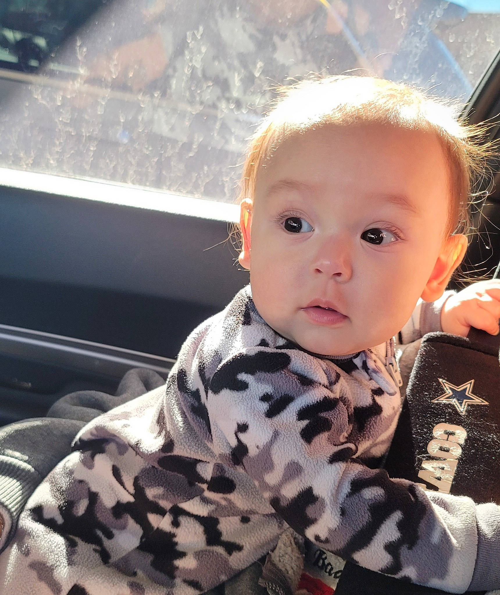 Santino is registered to the contest to win money with this photo: baby, baby_toddler_clothing, camouflage, cheek, child, comfort, eyebrow, fun, happy, iris, military_camouflage, pattern, person, selfie, sitting, sky, sleeve, surprise, t_shirt, toddler